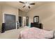 Spacious bedroom featuring a ceiling fan, neutral paint, and closet at 4190 Madison Dr, Cumming, GA 30040