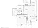 Floor plan of the first level includes a living room, kitchen, dining room, and garage at 4190 Madison Dr, Cumming, GA 30040