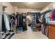 Well-organized walk-in closet with ample shelving and hanging space at 4190 Madison Dr, Cumming, GA 30040