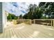 Large wooden deck perfect for outdoor entertaining and relaxation with views of a private backyard and mature trees at 440 Hickory Glen Sw Ln, Atlanta, GA 30311