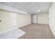 Basement featuring finished room, carpet, and tile at 440 Hickory Glen Sw Ln, Atlanta, GA 30311