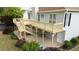 Well-maintained home featuring an expansive back deck, perfect for enjoying the outdoors at 440 Hickory Glen Sw Ln, Atlanta, GA 30311
