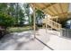 Spacious patio with a large backyard and wooded scenery, perfect for outdoor entertaining at 440 Hickory Glen Sw Ln, Atlanta, GA 30311