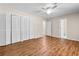 Spacious main bedroom with ample closet space, modern ceiling fan, and access to an en-suite bathroom at 6292 Field Glen Rd, Stone Mountain, GA 30087