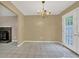 Dining room featuring tile flooring, chandelier, French doors, and access to the living area at 2675 Paul Thomas Dr, Dacula, GA 30019
