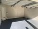 Spacious two car garage with painted floor, new door and room for storage at 3063 Grace Ct, Lawrenceville, GA 30043