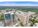 An aerial view highlights a modern building complex with a mix of residential and commercial spaces at 325 E Paces Ferry Ne Rd # 602, Atlanta, GA 30305