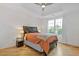 Cozy bedroom with hardwood floors, a ceiling fan, and natural light at 325 E Paces Ferry Ne Rd # 602, Atlanta, GA 30305