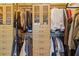 Custom closet with built-in storage solutions including shelving, drawers, and hanging rods at 325 E Paces Ferry Ne Rd # 602, Atlanta, GA 30305