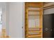 This closet features wooden shelves and a safe at 325 E Paces Ferry Ne Rd # 602, Atlanta, GA 30305