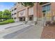 This building has brick pillars and a sidewalk lined with gravel and concrete at 325 E Paces Ferry Ne Rd # 602, Atlanta, GA 30305