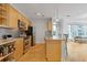 Open kitchen with stainless steel appliances, granite countertops, and hardwood floors at 325 E Paces Ferry Ne Rd # 602, Atlanta, GA 30305