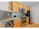 Well-equipped kitchen featuring stainless steel appliances and stylish backsplash at 325 E Paces Ferry Ne Rd # 602, Atlanta, GA 30305