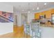 Open-concept kitchen with barstool seating, perfect for entertaining, flowing into the living room at 325 E Paces Ferry Ne Rd # 602, Atlanta, GA 30305