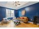 Charming living room with hardwood floors, modern furnishings, and a view of the cityscape at 325 E Paces Ferry Ne Rd # 602, Atlanta, GA 30305