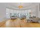 Bright living room with hardwood floors and expansive windows with neighborhood views at 325 E Paces Ferry Ne Rd # 602, Atlanta, GA 30305