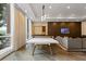 This community lounge has comfortable seating, a TV and a pool table at 325 E Paces Ferry Ne Rd # 602, Atlanta, GA 30305
