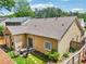 Outdoor patio area featuring a fire pit and seating, perfect for relaxing in the enclosed backyard at 409 Norton Xing, Woodstock, GA 30188