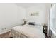 Comfortable bedroom featuring neutral walls, hardwood floors, and natural light at 409 Norton Xing, Woodstock, GA 30188