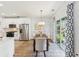 Charming dining area with access to the kitchen and a sliding door to the backyard at 409 Norton Xing, Woodstock, GA 30188