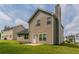 A view of the house's exterior with a lawn, door, and chimney at 4870 Heather Mill Trce, Snellville, GA 30039