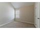 Neutral bedroom features plush carpet, a window, and a door to a closet at 4870 Heather Mill Trce, Snellville, GA 30039