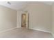 Bedroom features carpet, a vaulted ceiling, a walk-in closet, and fresh paint at 4870 Heather Mill Trce, Snellville, GA 30039