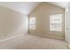 Bedroom with carpet, large windows, vaulted ceilings, and fresh paint at 4870 Heather Mill Trce, Snellville, GA 30039