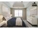 Staged main bedroom with a tray ceiling, large window, and neutral carpet at 4870 Heather Mill Trce, Snellville, GA 30039