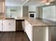 Kitchen with granite countertops and stainless steel appliances at 7721 Fawn Cir, Covington, GA 30014
