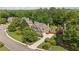 Aerial view of a home, showcasing its landscaped yard and neighborhood at 1440 Water View Ln, Suwanee, GA 30024