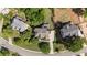 Aerial view of a home with a well-manicured lawn in a residential neighborhood at 1440 Water View Ln, Suwanee, GA 30024