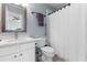This bathroom has a shower-tub combo and an updated vanity at 1440 Water View Ln, Suwanee, GA 30024
