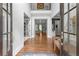 Grand foyer with hardwood floors and high ceilings at 1440 Water View Ln, Suwanee, GA 30024