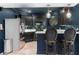 Gourmet kitchen featuring granite countertops, modern appliances, and a stainless steel refrigerator at 1440 Water View Ln, Suwanee, GA 30024