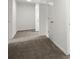 Hallway with carpet and multiple doors at 1627 Rex Dr, Marietta, GA 30066