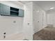 Laundry room with overhead cabinets at 1627 Rex Dr, Marietta, GA 30066