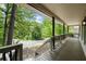 View from a wrap-around porch with railing overlooking the neighborhood at 1627 Rex Dr, Marietta, GA 30066