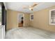 Sunroom with views to interior and exterior, ceiling fan and light walls at 1627 Rex Dr, Marietta, GA 30066
