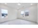 Bright bedroom with neutral color palette and ample natural light from large windows at 2505 Kirkwood Dr, Cumming, GA 30041