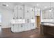 Kitchen featuring white cabinets, stainless steel appliances, and a spacious island at 2505 Kirkwood Dr, Cumming, GA 30041