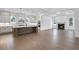 Bright open kitchen with a large island and access to the living room fireplace at 2505 Kirkwood Dr, Cumming, GA 30041