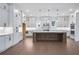Spacious kitchen with an island, white cabinets and stainless steel appliances at 2505 Kirkwood Dr, Cumming, GA 30041