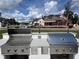 State-of-the-art outdoor kitchen featuring stainless steel grill and ample counter space at 2505 Kirkwood Dr, Cumming, GA 30041
