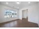 Bright, airy room with large windows overlooking the front yard and hardwood floors at 2505 Kirkwood Dr, Cumming, GA 30041