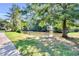 Scenic view of pond with bench and lush greenery, perfect for relaxation at 300 Bermuda Ct, Dallas, GA 30157