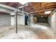 The unfinished basement is spacious and functional, with exposed utilities and potential for storage at 527 Tomahawk Trl, Woodstock, GA 30188