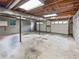 The unfinished basement offers ample space and potential for customization and storage at 527 Tomahawk Trl, Woodstock, GA 30188