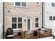 Charming back porch with seating, grill, perfect for enjoying outdoor relaxation and barbecues at 10200 Windalier Way, Roswell, GA 30076