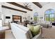 A spacious common area with comfortable seating, exposed beams, and stylish decor; ideal for community gatherings at 10200 Windalier Way, Roswell, GA 30076